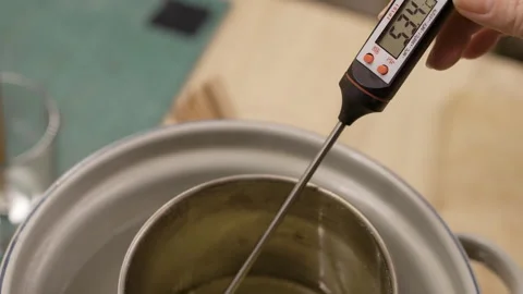 Creative hobby DIY candles at home. Candlemaker making aroma candle 스톡 동영상 329418048