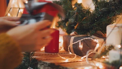Creative hobby. Gift wrapping. Packaging modern christmas present boxes in Stock Footage 102880459