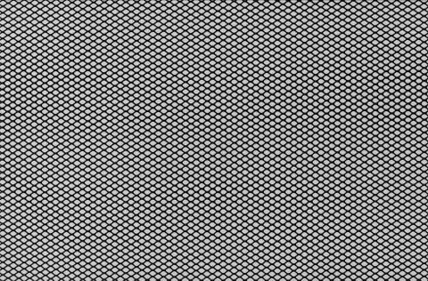 Creative hole net grate on gray background 스톡 사진