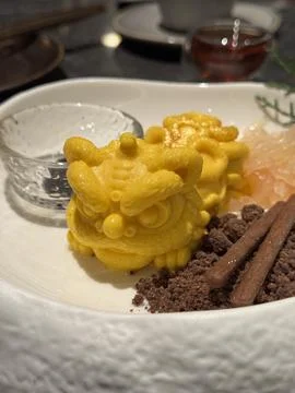 Creative Hong Kong mango pudding shaped like Chinese lion dance lion Stock Photos