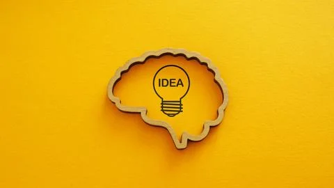 Creative idea inside brain highlighting innovation and problem solving. Stock Photos