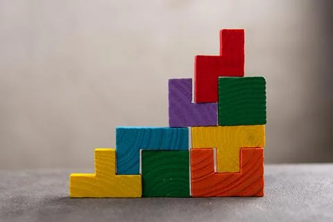 Creative idea solution - business concept, jigsaw puzzle close up. Leadership Stock Photos