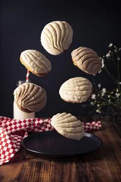 Creative image of Conchas Bread. Mexican sweet bread roll with seashell-like  스톡 사진