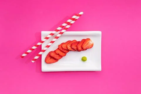 Creative image of fresh strawberries in the form of sushi rolls Stock Photos