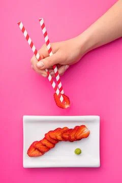 Creative image of fresh strawberries in the form of sushi rolls Stock Photos