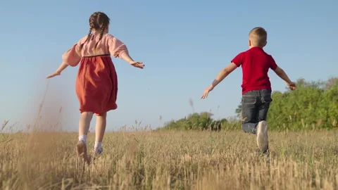 Creative imagination of children, concept of active play in nature. Kids fly 스톡 동영상 241961199