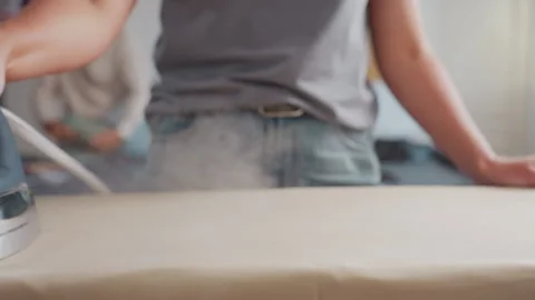Creative Individuals Ironing Material And Arranging Colorful Fabrics In Fashion Stock Footage 307137739