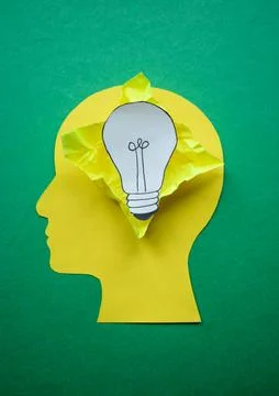Creative Innovation Concept with Light Bulb Inside Human Head Silhouette Stock Photos