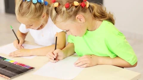 Creative kids engaged in art activities at a bright classroom Vídeos de archivo 296332237