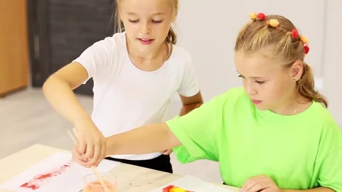 Creative kids express themselves through colorful painting activity indoors Stock-Footage 296332685