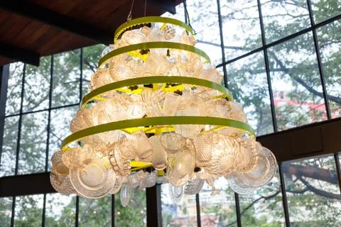 Creative lamp warm tone made from glass plates Stock Photos