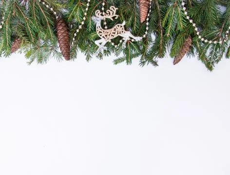 Creative layout of the branches of the Christmas tree with pine cones and pap Stock Photos
