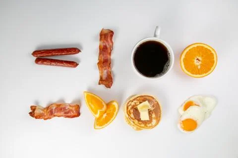 Creative layout - breakfast essentials on white background Stock Photos