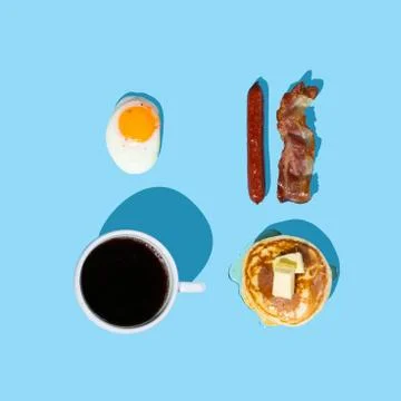 Creative layout - breakfast essentials on white background Stock Photos