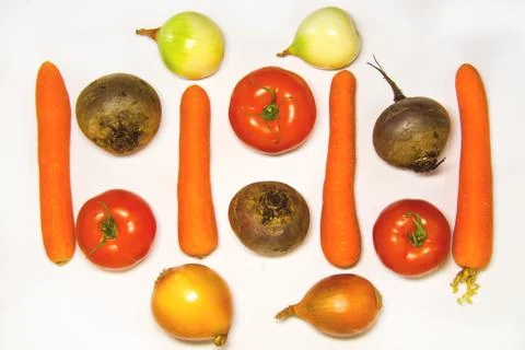 Creative layout of cabbage, onions, tomatoes, potatoes, carrots, beets. The c Stock Photos