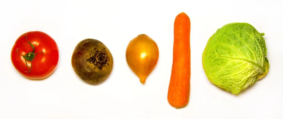 Creative layout of cabbage, onions, tomatoes, potatoes, carrots, beets. The c Stock Photos
