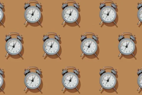 Creative layout of gray alarm clock's Stock Photos