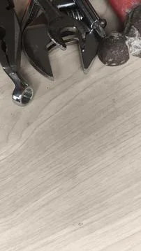 Creative layout of hand tools on aged wooden boards for construction, repai.. Stock-Fotos