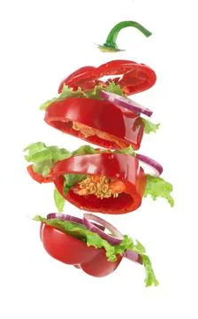 Creative layout made of bell pepper, cucumber and salad leaves.Food concept. Stock Photos