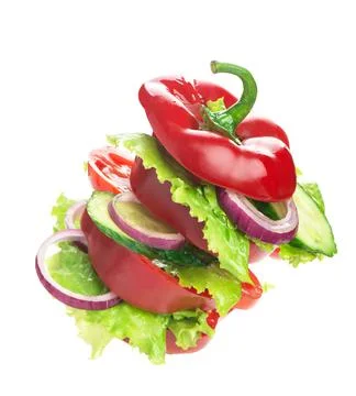 Creative layout made of bell pepper, cucumber and salad leaves.Food concept. Stock Photos