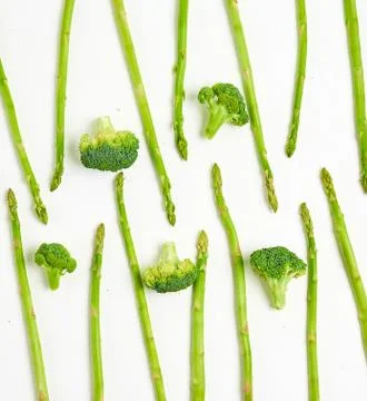 Creative layout made of broccoli and asparagus . Flat lay. Food concept. Vege Fotos de archivo