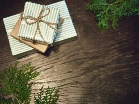 Creative layout made of Christmas tree branches with gifts. Flat 스톡 사진