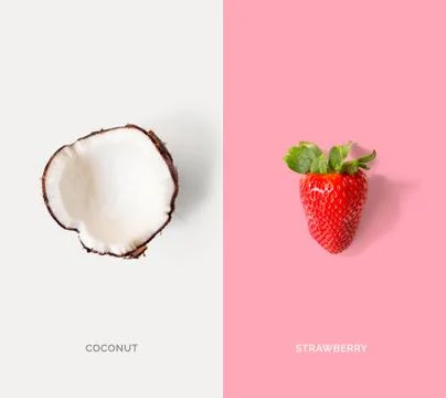 Creative layout made of coconuts and strawberry. Food concept. Stock Photos