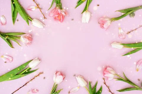 Creative layout made of colorful spring flowers and green leaves. Minimal Stock Photos