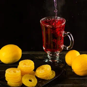 Creative layout made of cup of hibiscus tea and lemon on a white background. Top Stock Photos