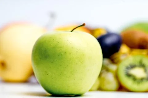 Creative layout made of fruits on a white background Stock Photos
