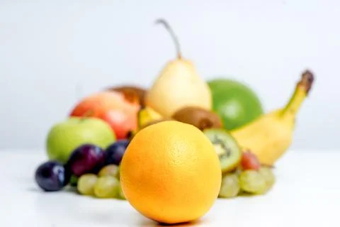 Creative layout made of fruits on a white background Stock Photos