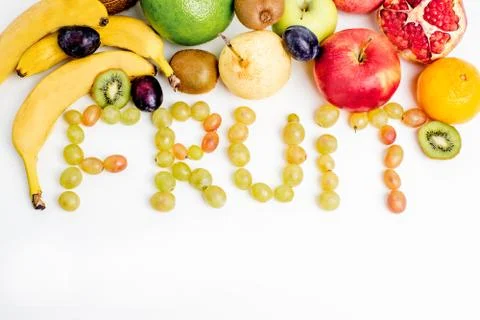 Creative layout made of fruits on a white background Stock Photos