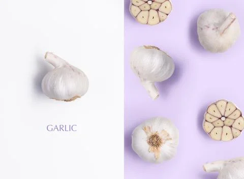 Creative layout made of garlic. Flat lay with copy space. Fresh food concept. Stock Photos