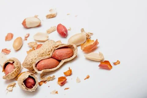 Creative layout made of hazelnut nuts, almonds, walnut, peanut, cashew on whi Stock Photos
