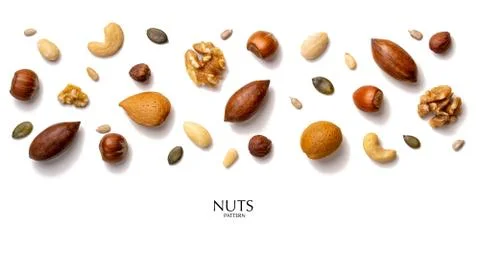 Creative layout made of hazelnut nuts, almonds, walnut, peanut, pecan, sunflo Stock Photos
