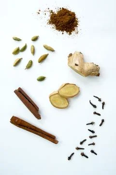Creative layout made of masala tea on white background. Indian drink. Stock Photos