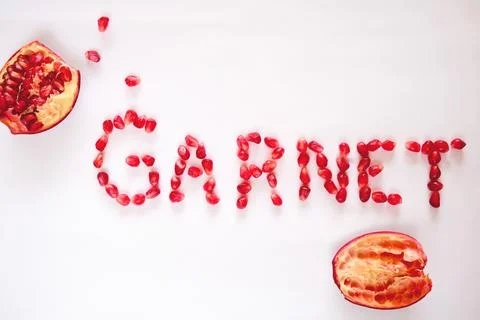 Creative layout made of pomegranate. Flat lay. Food concept. Macro concept. Stock Photos