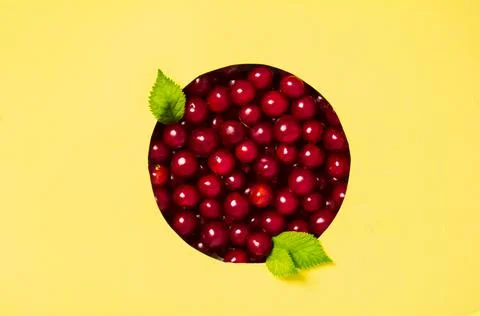 Creative layout of ripe cherries. Background from summer berries Stock Photos