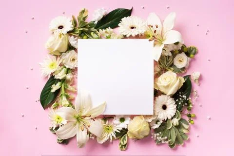 Creative layout with white flowers, square shape paper for copyspace over pink Stock Photos