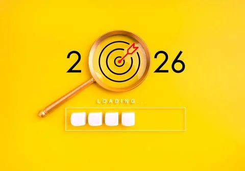 Creative loading bar concept with 2026 target under magnifying glass on yel.. Stock Photos