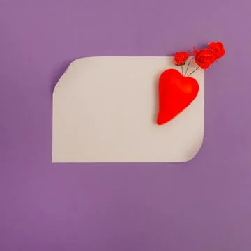 Creative love composition with red elements. Asymmetrical red heart with red Stock Photos