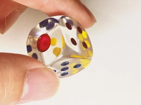 Creative Macro of Translucent Liquid-Effect Dice for Composite and Retouchin Stock Photos