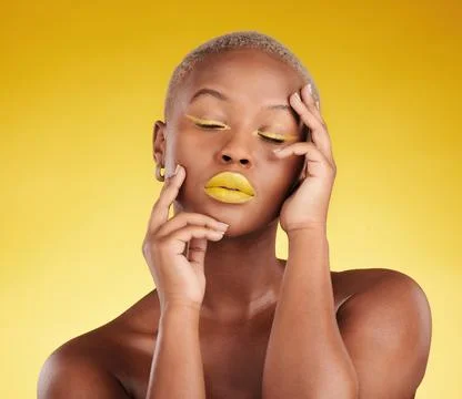 Creative, makeup and face with lipstick or black woman in studio on a yellow Stock Photos