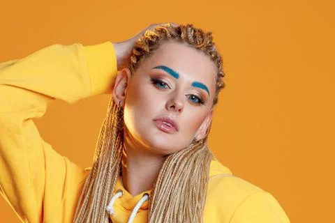 Creative makeup with bright blue eyebrows and blue eyeliner, Stock Photos