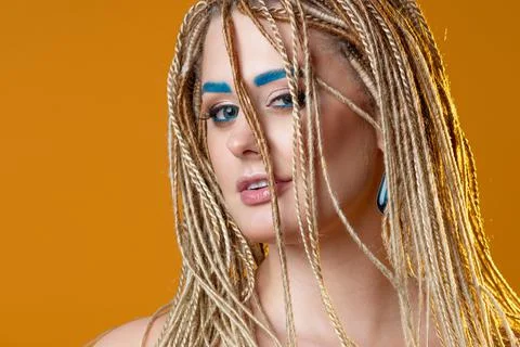 Creative makeup with bright blue eyebrows and blue eyeliner, Stock Photos