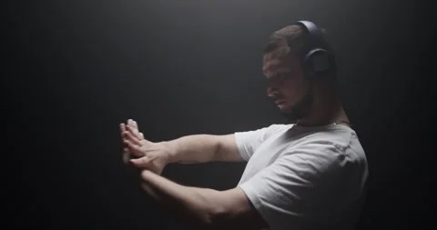 Creative male dancer performing in spotlight Stock Footage 244525853