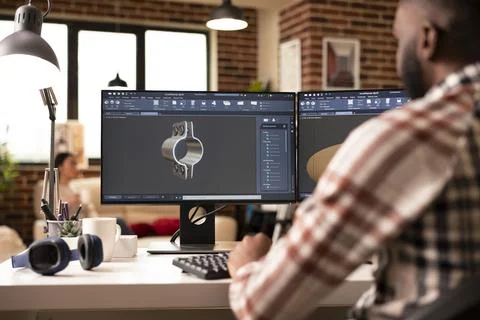 Creative male developer designing 3d tool prototypes Stock Photos