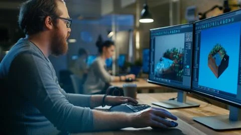 Creative Male Game Developer Works with Graphics for the New Level Design, He 스톡 사진