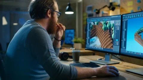 Creative Male Game Developer Works with Graphics for the New Level Design, He 스톡 사진