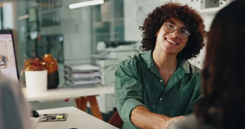 Creative, man and client in office with handshake for interview, onboarding or Vidéo 294522490